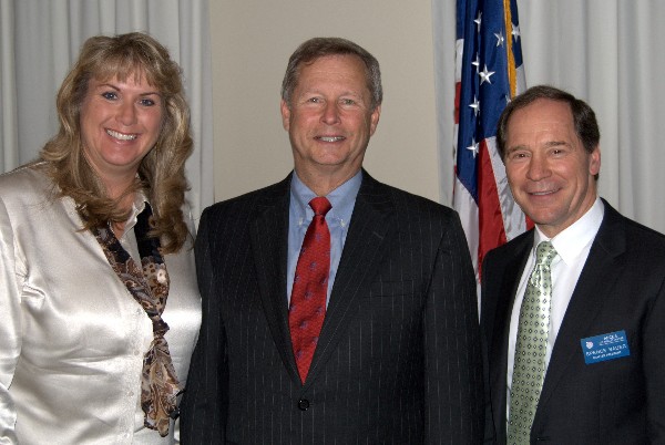 Col. Bob Cox, USAF (Ret.) (c), deputy director, Earth Science Technology Directorate and director of the National Space Technology Applications Office at the Jet Propulsion Laboratory, joins Laura Pope, chapter director, and Spencer Bauer, chapter president, following the colonel's speech at the August meeting.